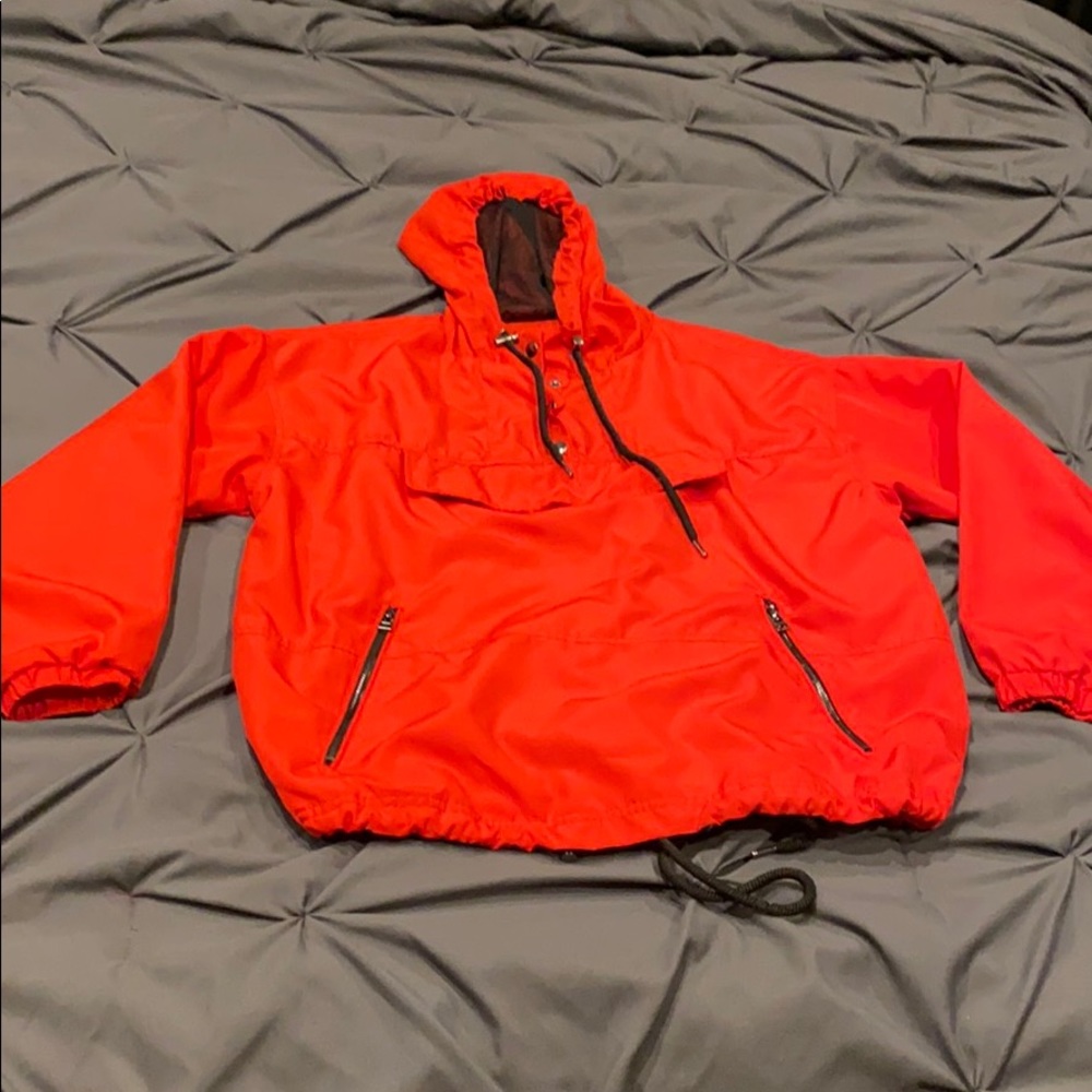 Red windbreaker jacket